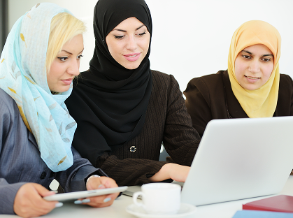 Group of learners using laptops